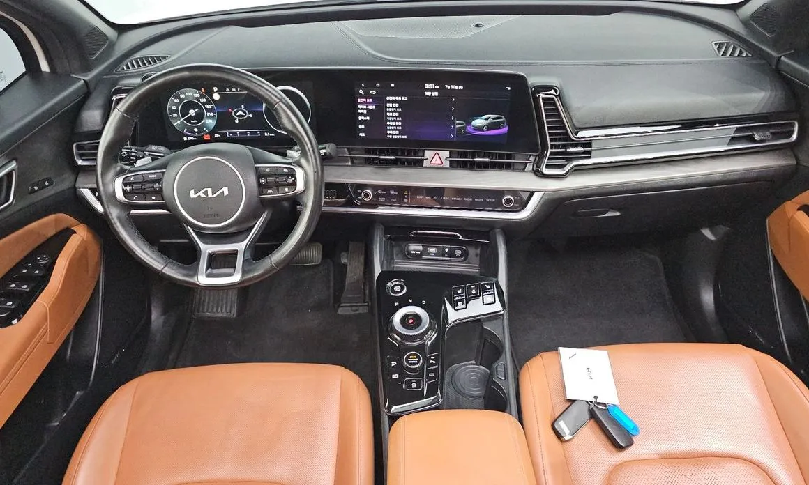 Kia Sportage — фото 10