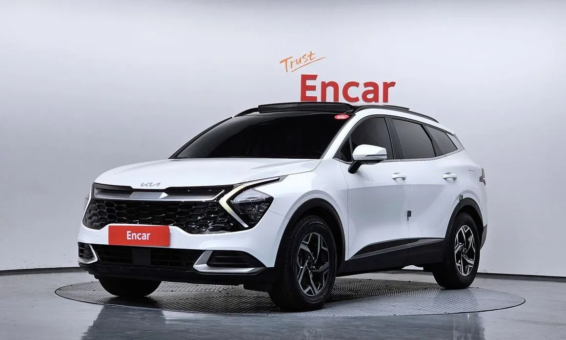 Kia Sportage — фото 1