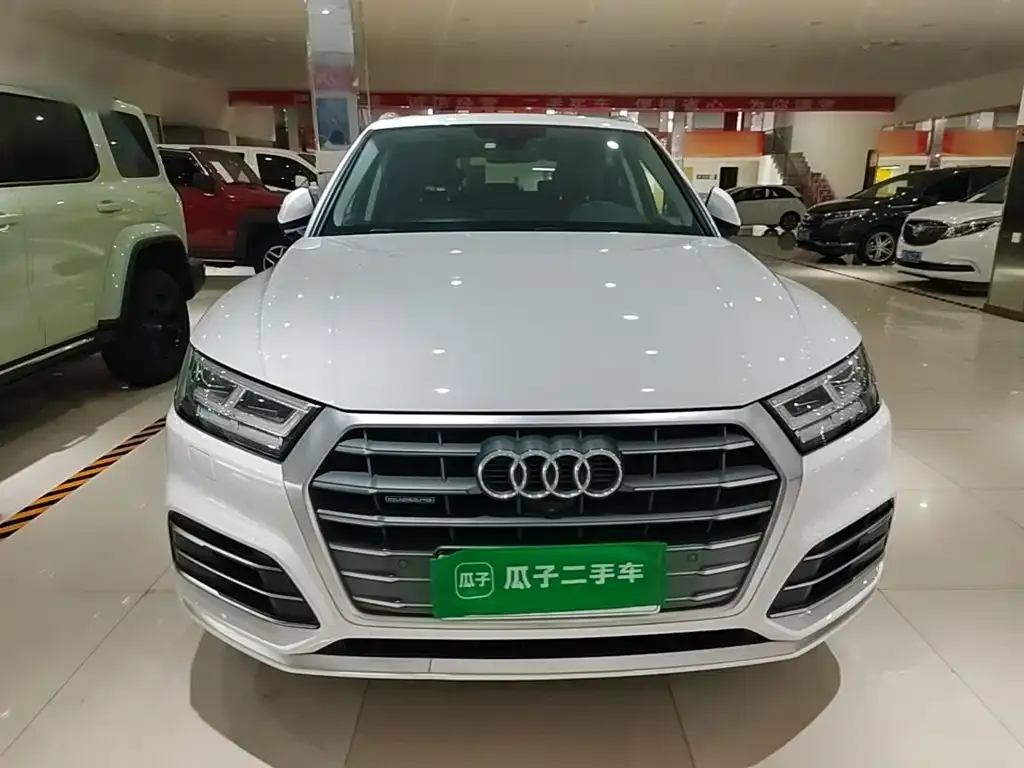 Audi Q5L — фото 10
