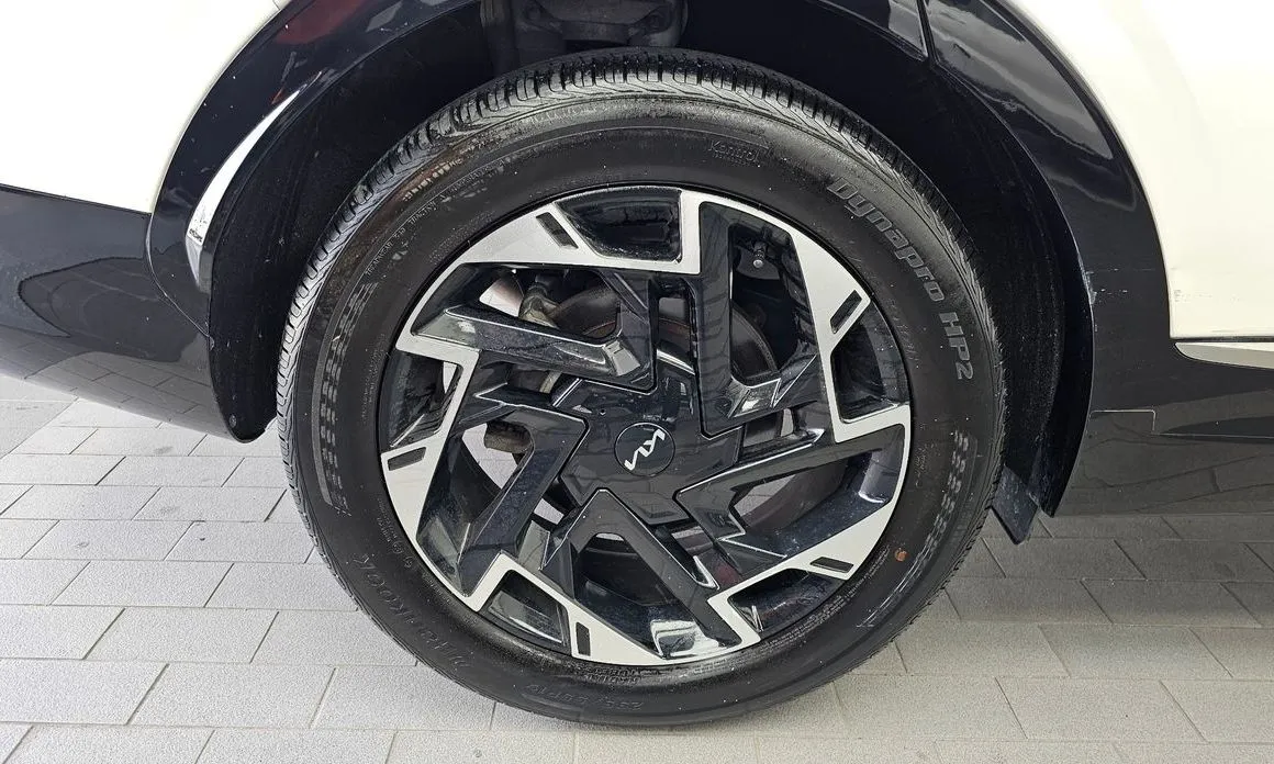 Kia Sportage — фото 10