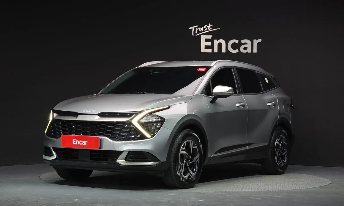 Kia Sportage — фото 1
