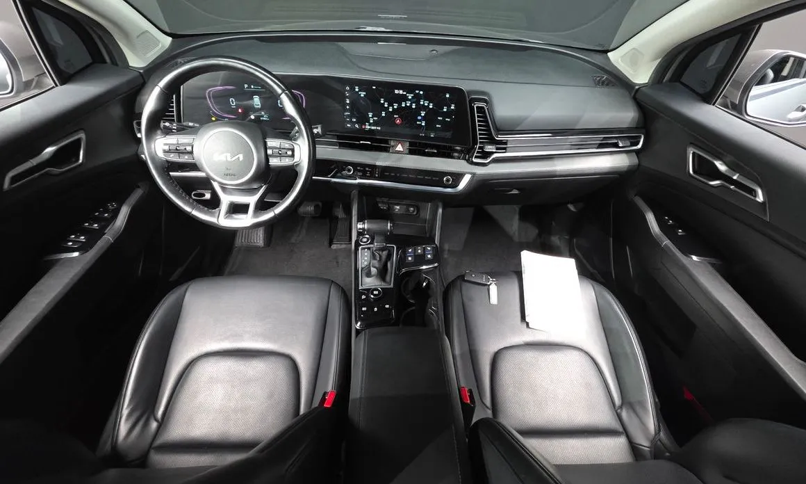 Kia Sportage — фото 10