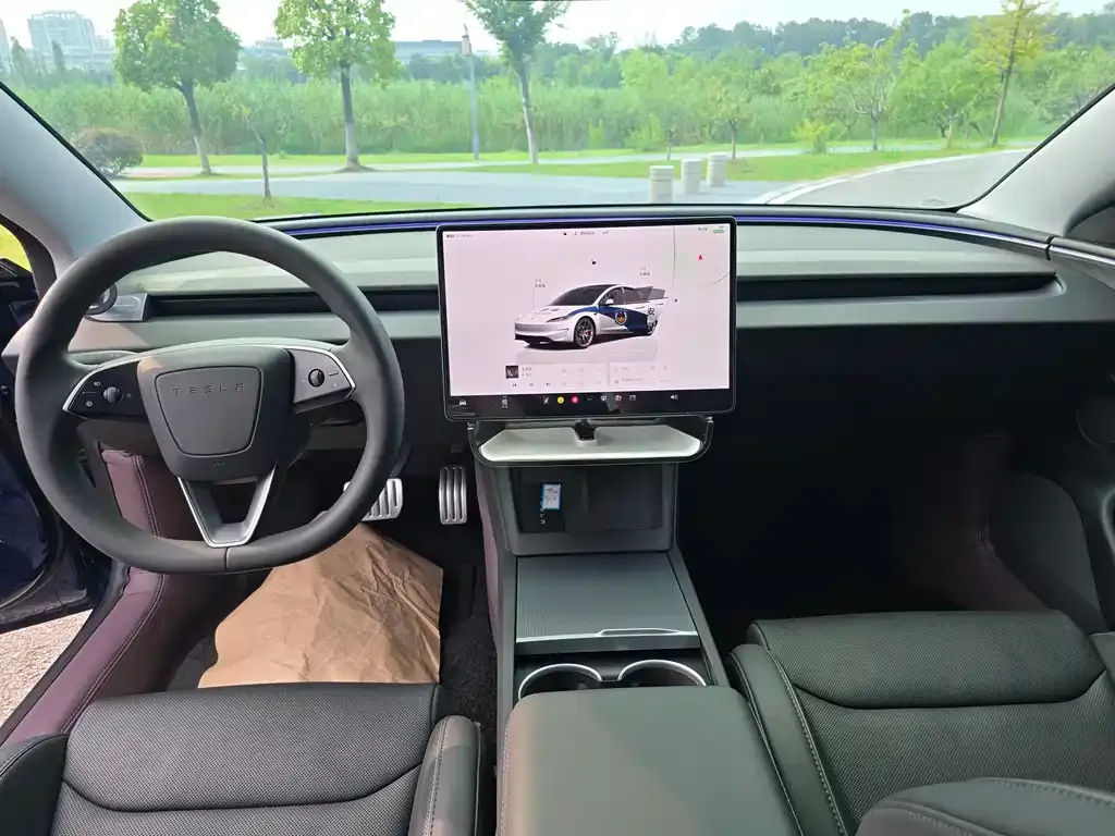 Tesla Model 3 — фото 9