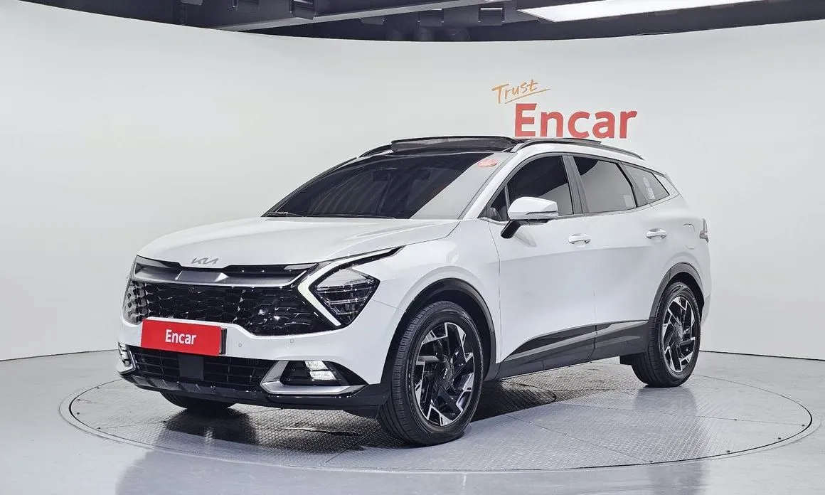 Kia Sportage — фото 1