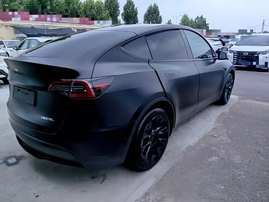 Tesla Model Y — фото 10