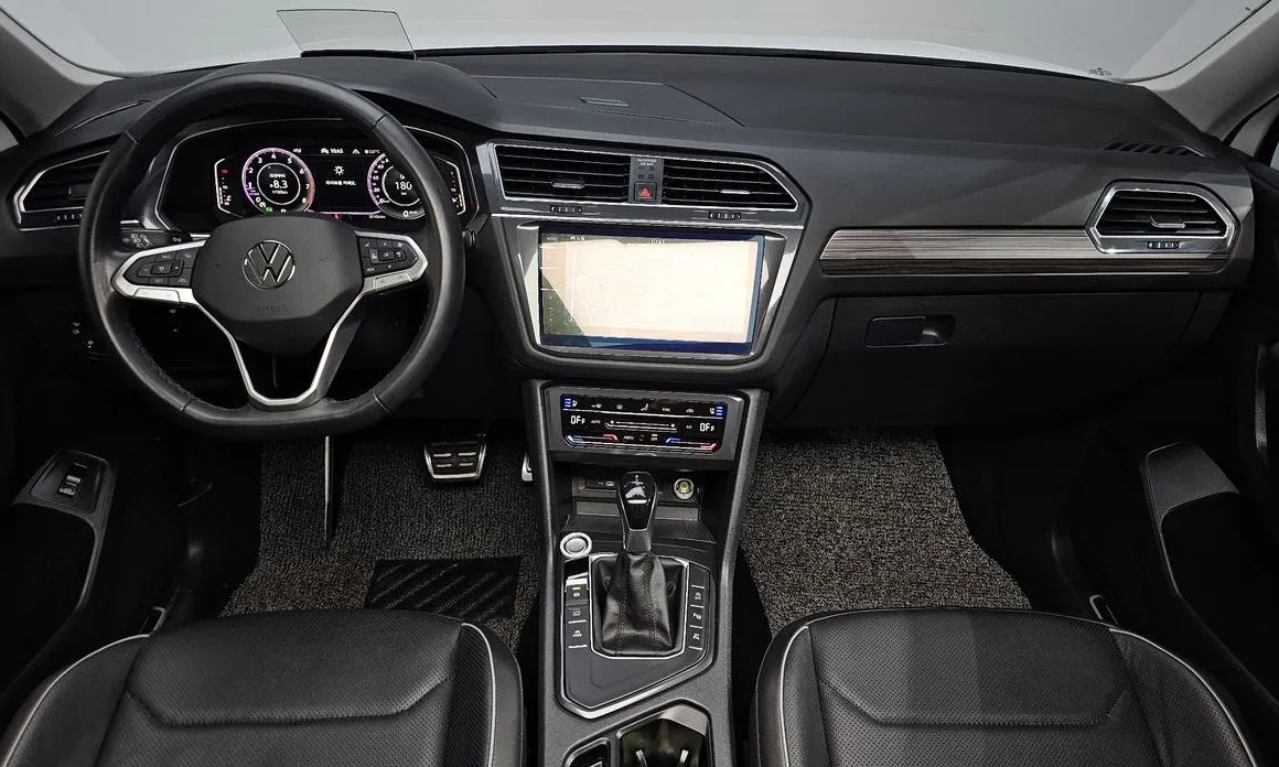 Volkswagen Tiguan — фото 9