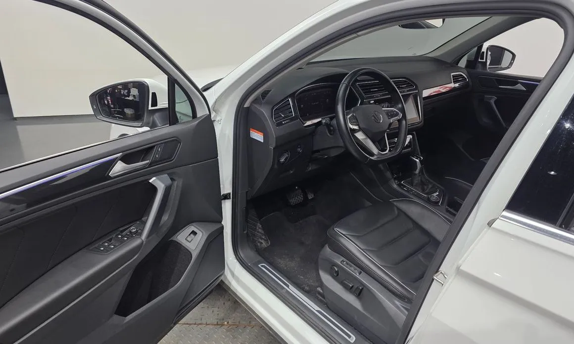 Volkswagen Tiguan — фото 5