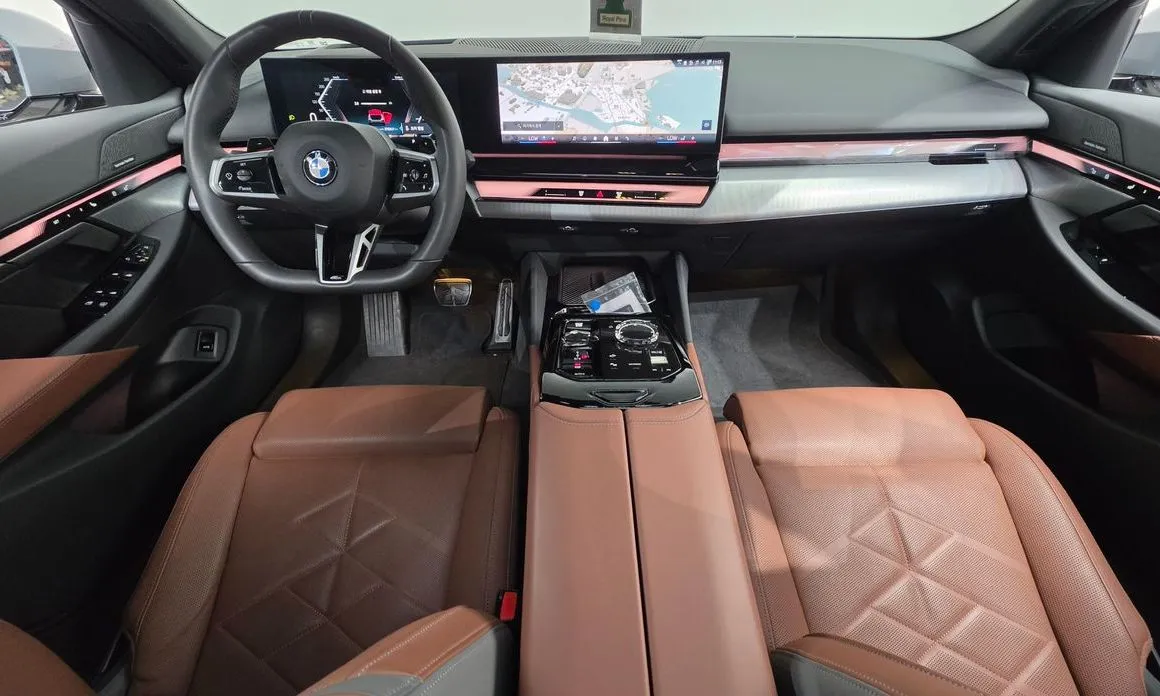 BMW 5-Series — фото 10