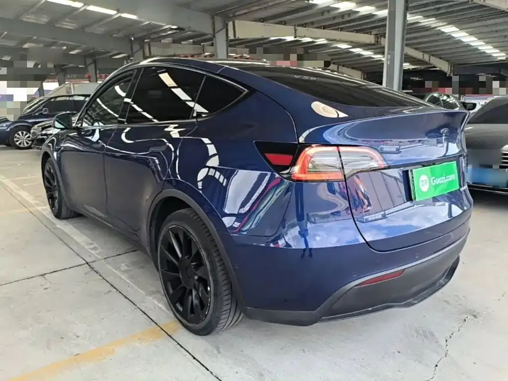 Tesla Model Y — фото 10
