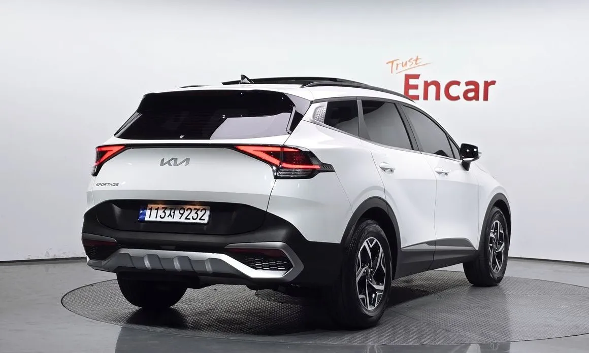 Kia Sportage — фото 7