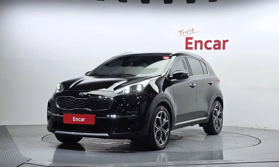 Kia Sportage — фото 1
