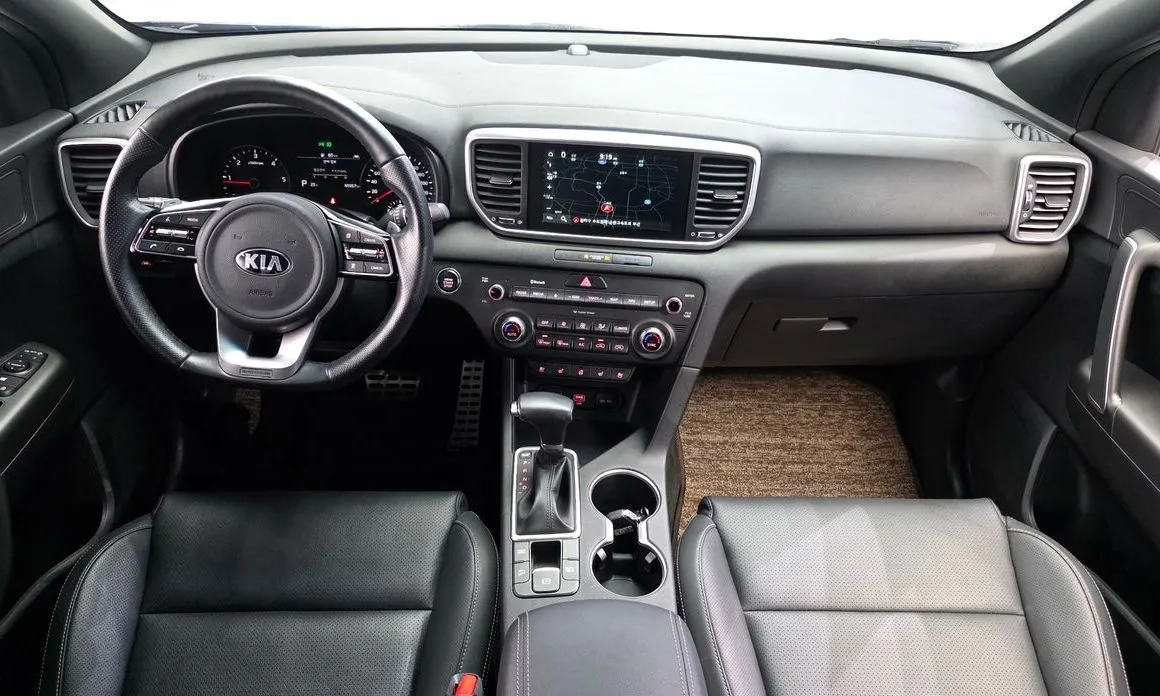 Kia Sportage — фото 10