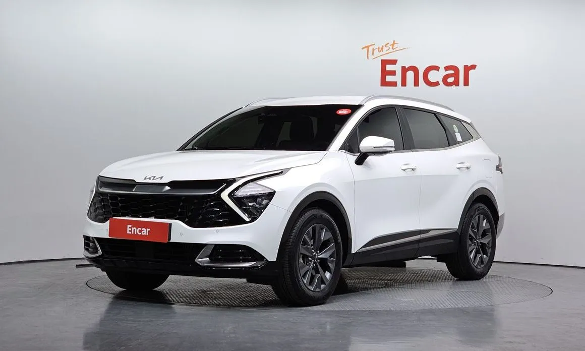 Kia Sportage — фото 1
