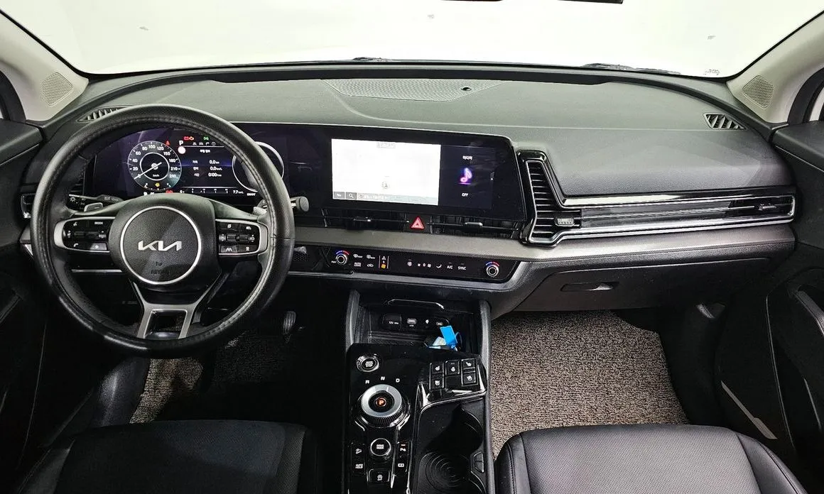 Kia Sportage — фото 10