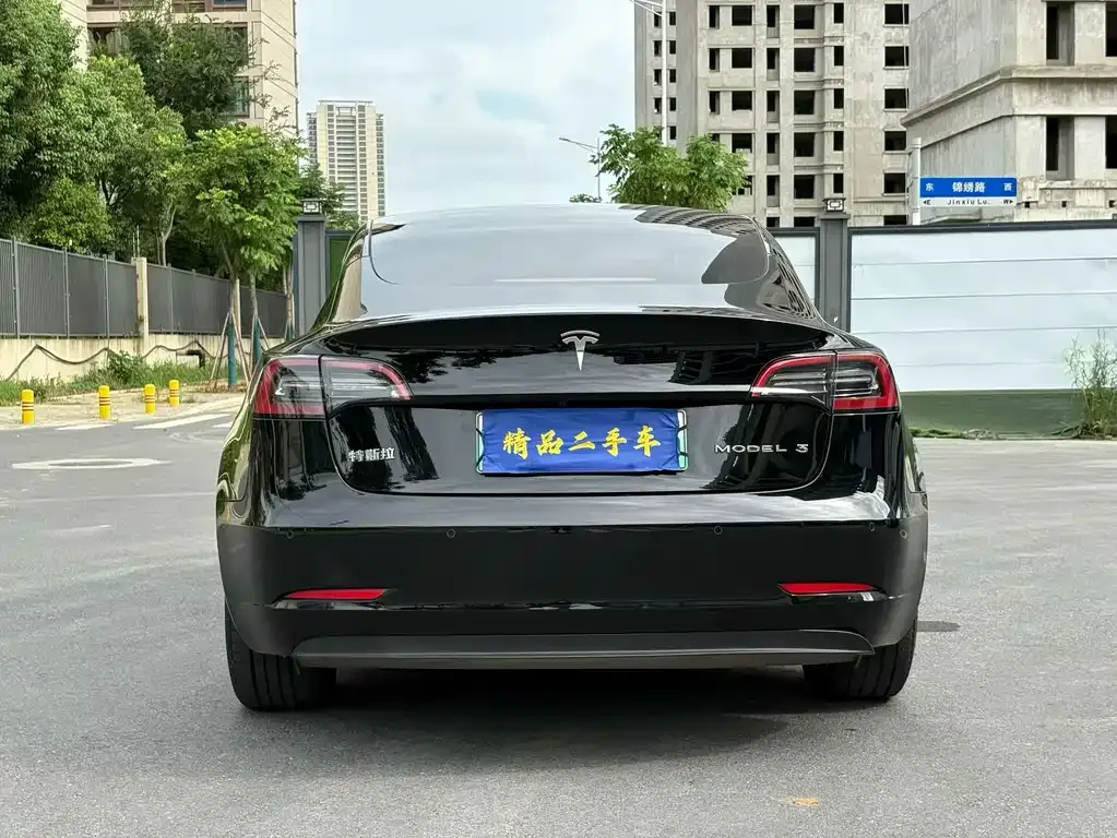 Tesla Model 3 — фото 7