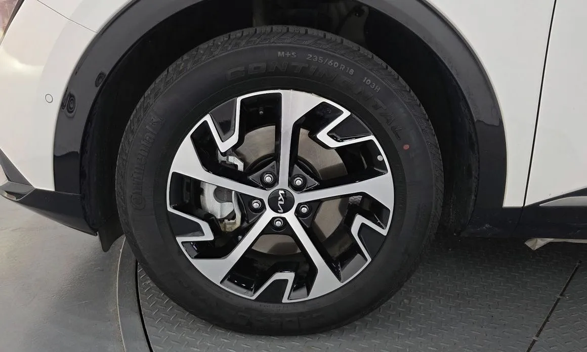 Kia Sportage — фото 9