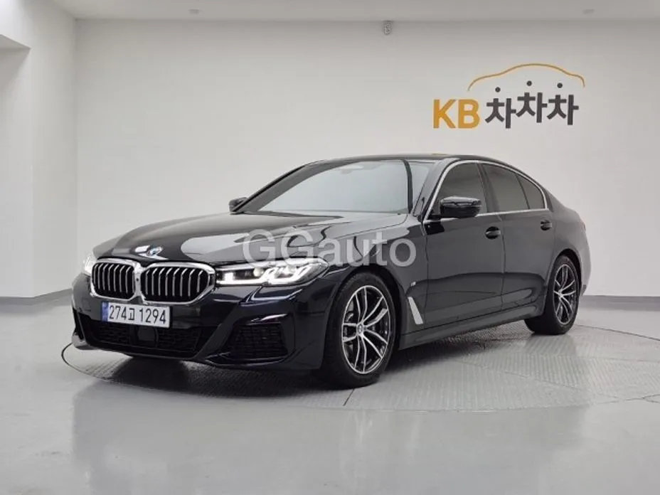 BMW 5-Series — фото 1