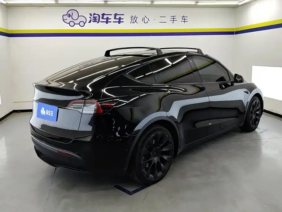 Tesla Model Y — фото 10