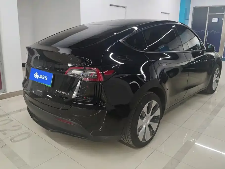 Tesla Model Y — фото 7