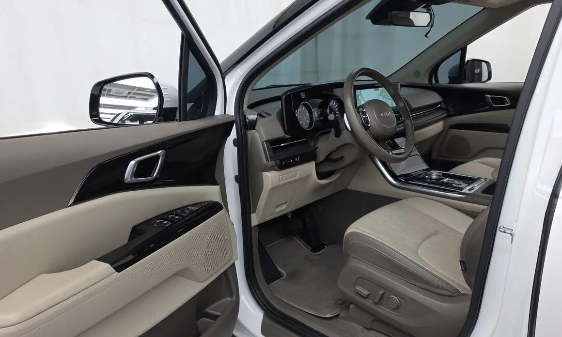 Kia Carnival — фото 10
