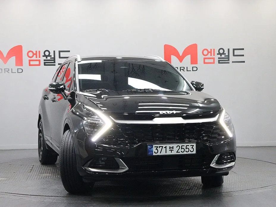 Kia Sportage — фото 1