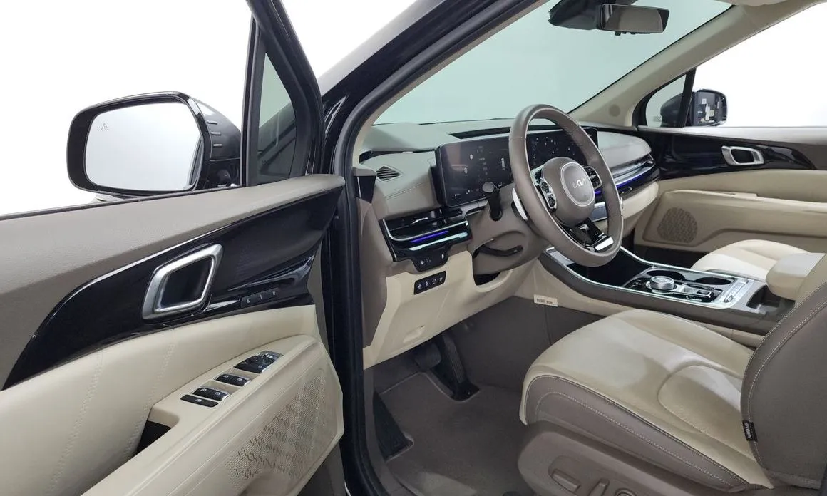 Kia Carnival — фото 10