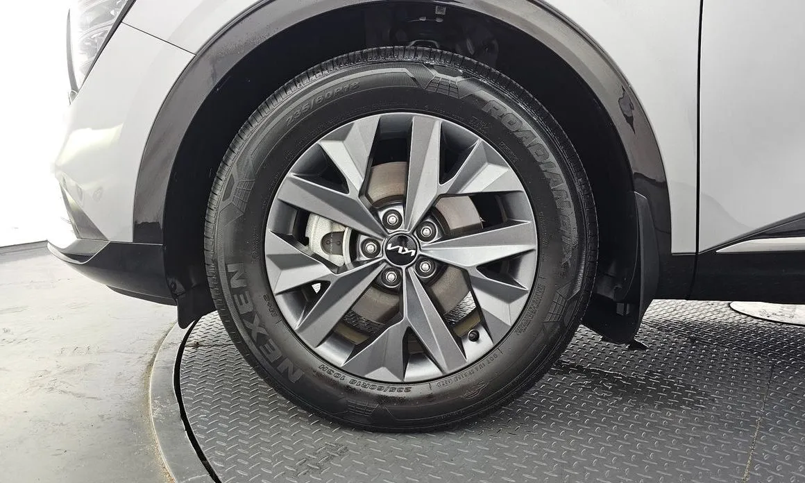 Kia Sportage — фото 10