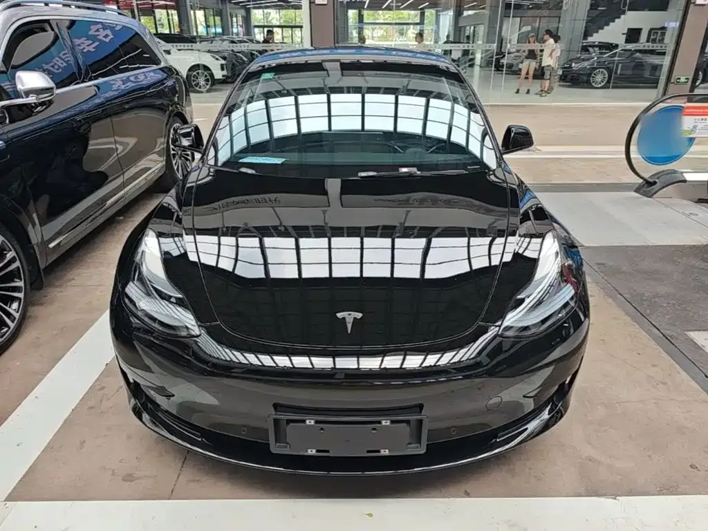 Tesla Model 3 — фото 5