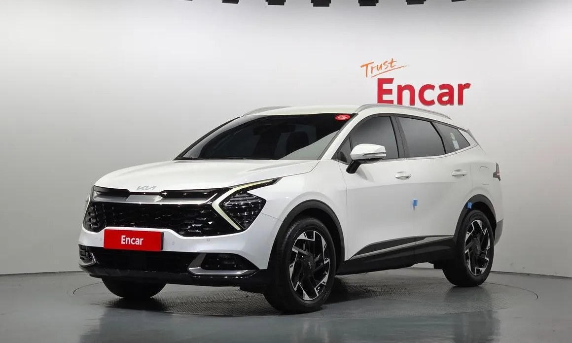 Kia Sportage — фото 1