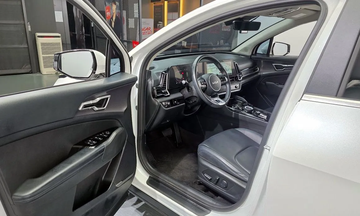 Kia Sportage — фото 8