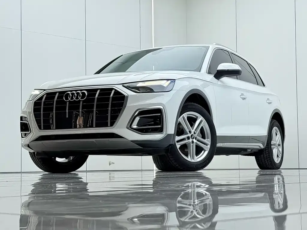 Audi Q5L — фото 6