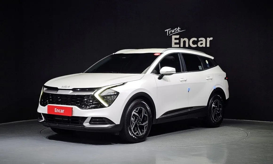 Kia Sportage — фото 1