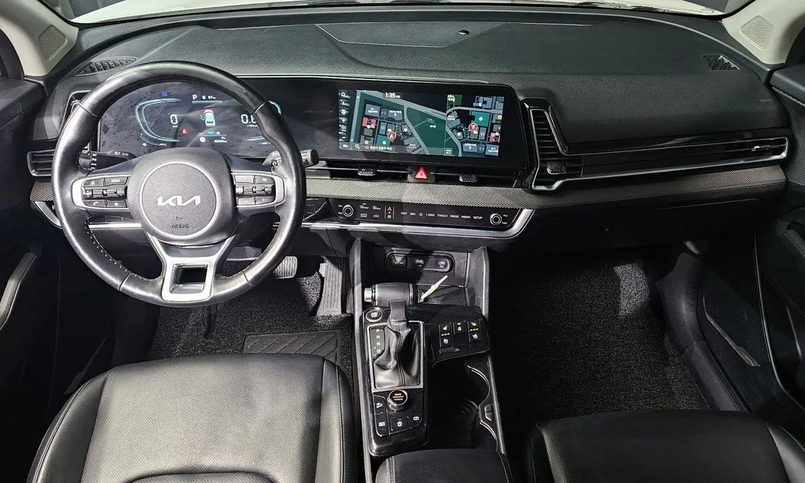 Kia Sportage — фото 10