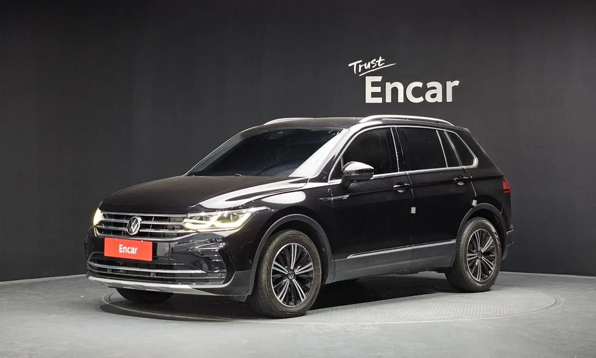 Volkswagen Tiguan — фото 1