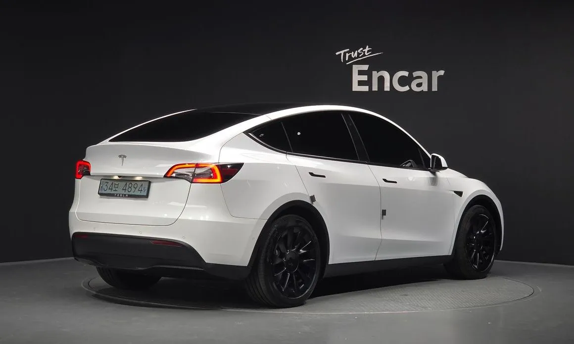 Tesla Model Y — фото 6