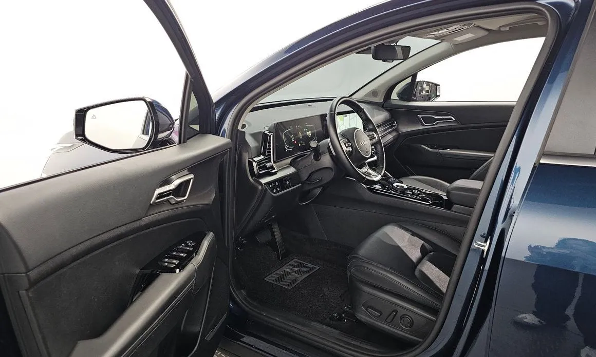 Kia Sportage — фото 9