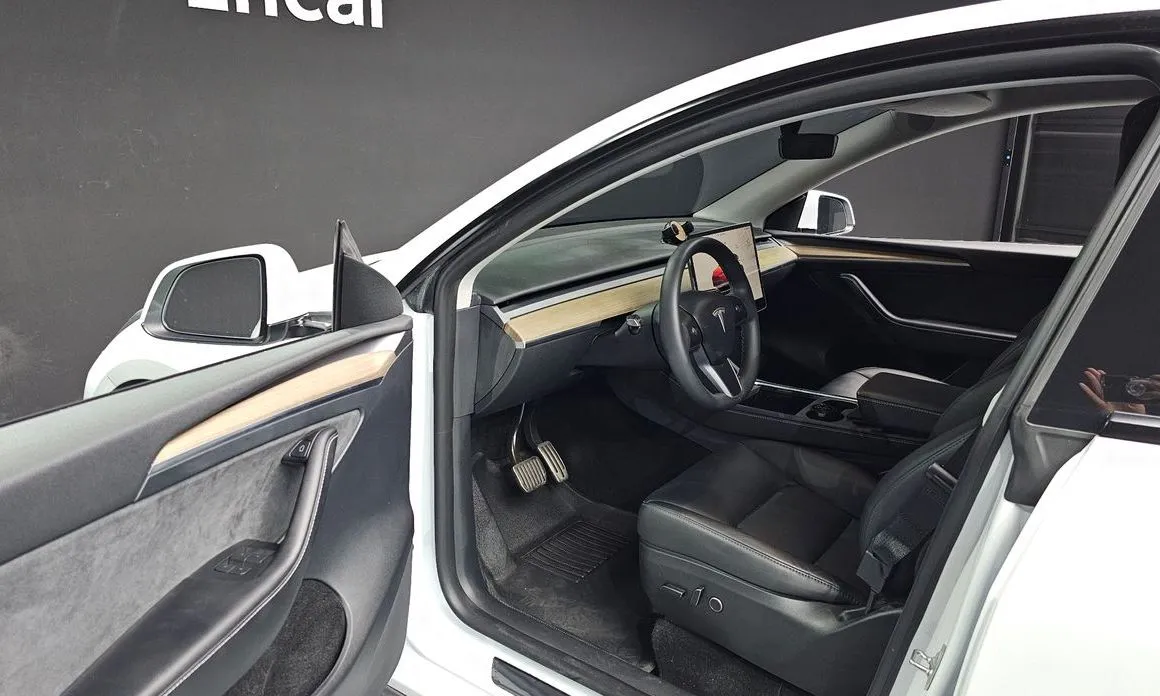 Tesla Model Y — фото 7