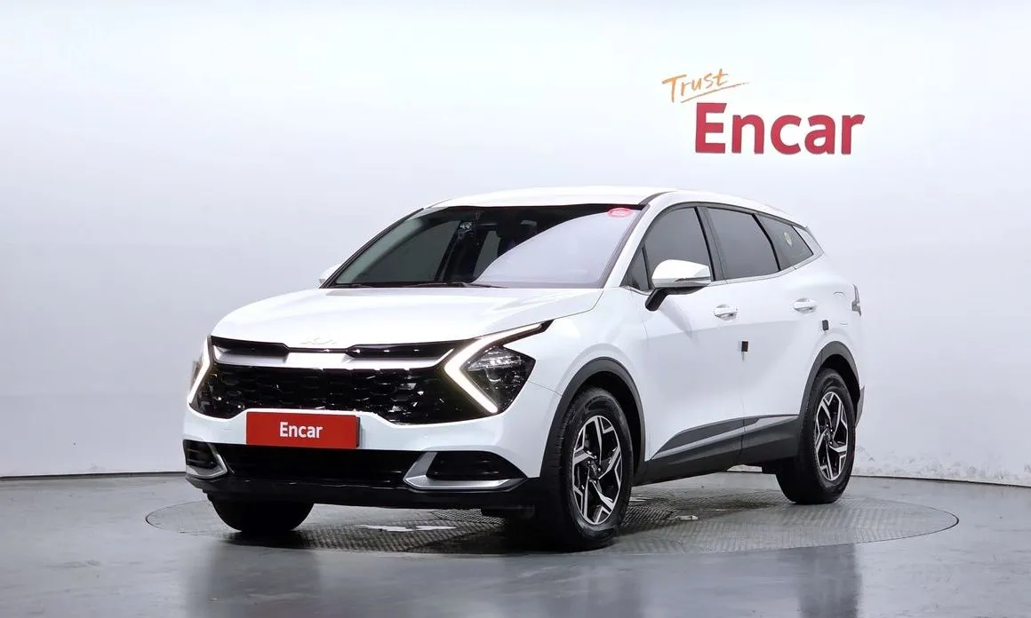 Kia Sportage — фото 1