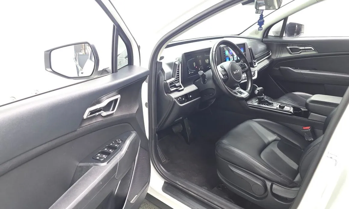 Kia Sportage — фото 10