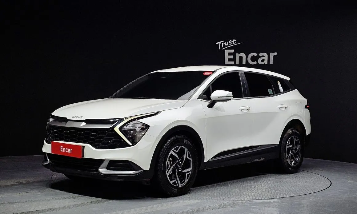 Kia Sportage — фото 1