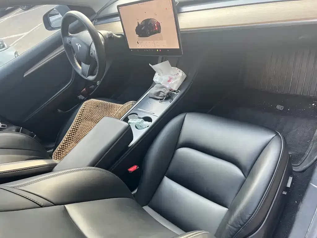 Tesla Model 3 — фото 9