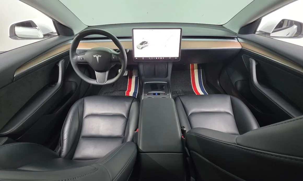 Tesla Model 3 — фото 7