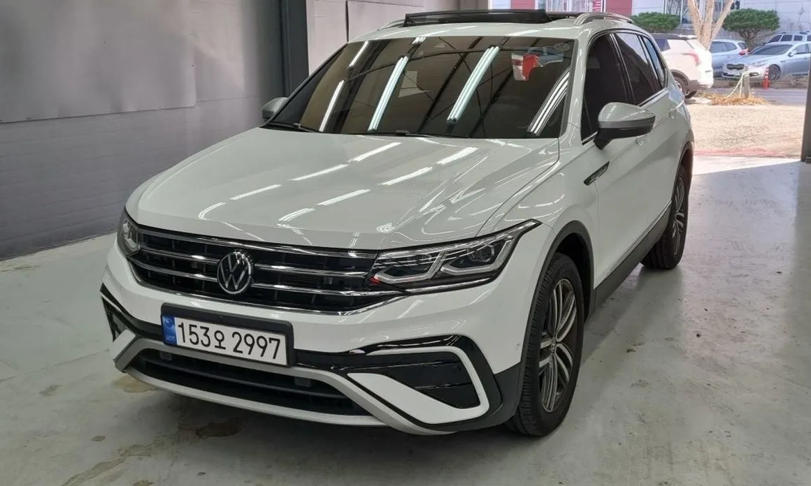 Volkswagen Tiguan — фото 1