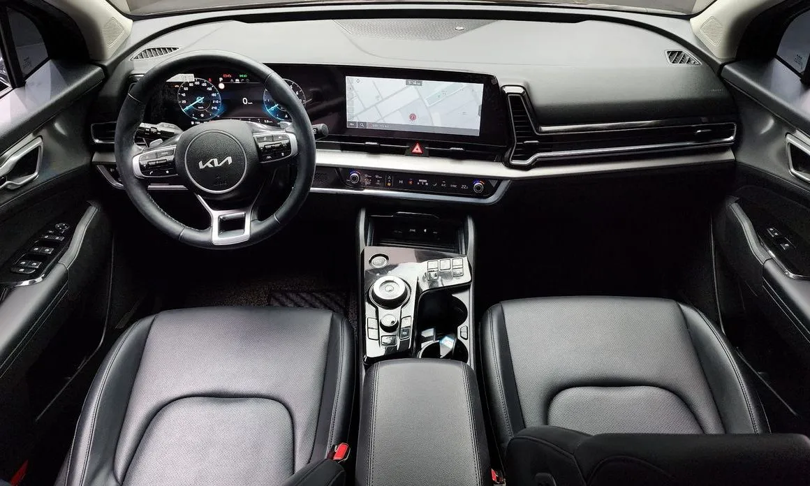 Kia Sportage — фото 7