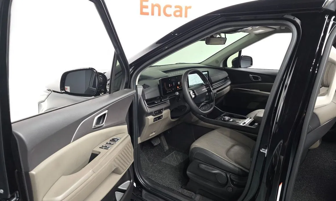 Kia Carnival — фото 10