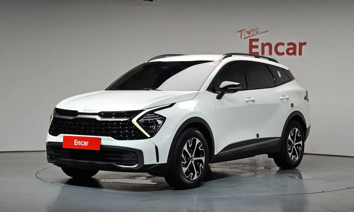 Kia Sportage — фото 1
