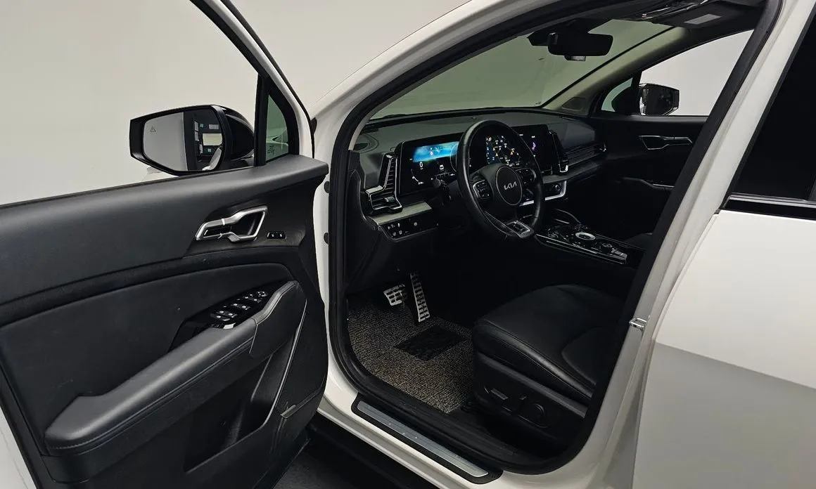 Kia Sportage — фото 8
