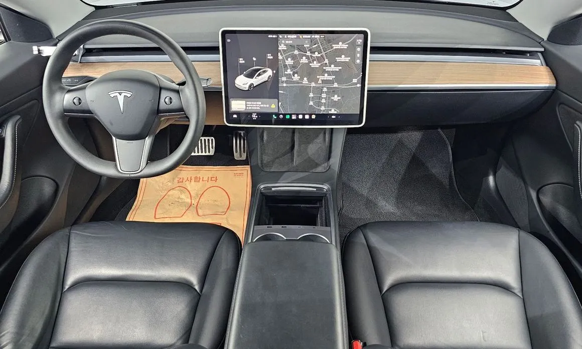 Tesla Model 3 — фото 9