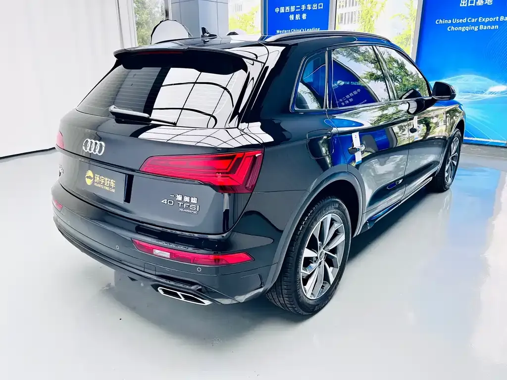 Audi Q5L — фото 10