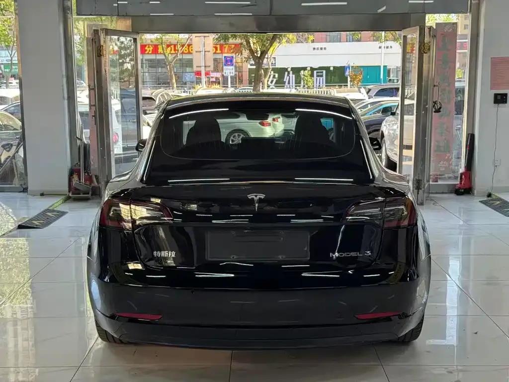 Tesla Model 3 — фото 6